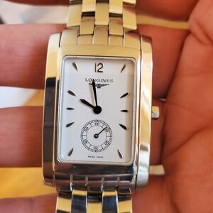 Longines Elegant Silver Timepiece with White Face